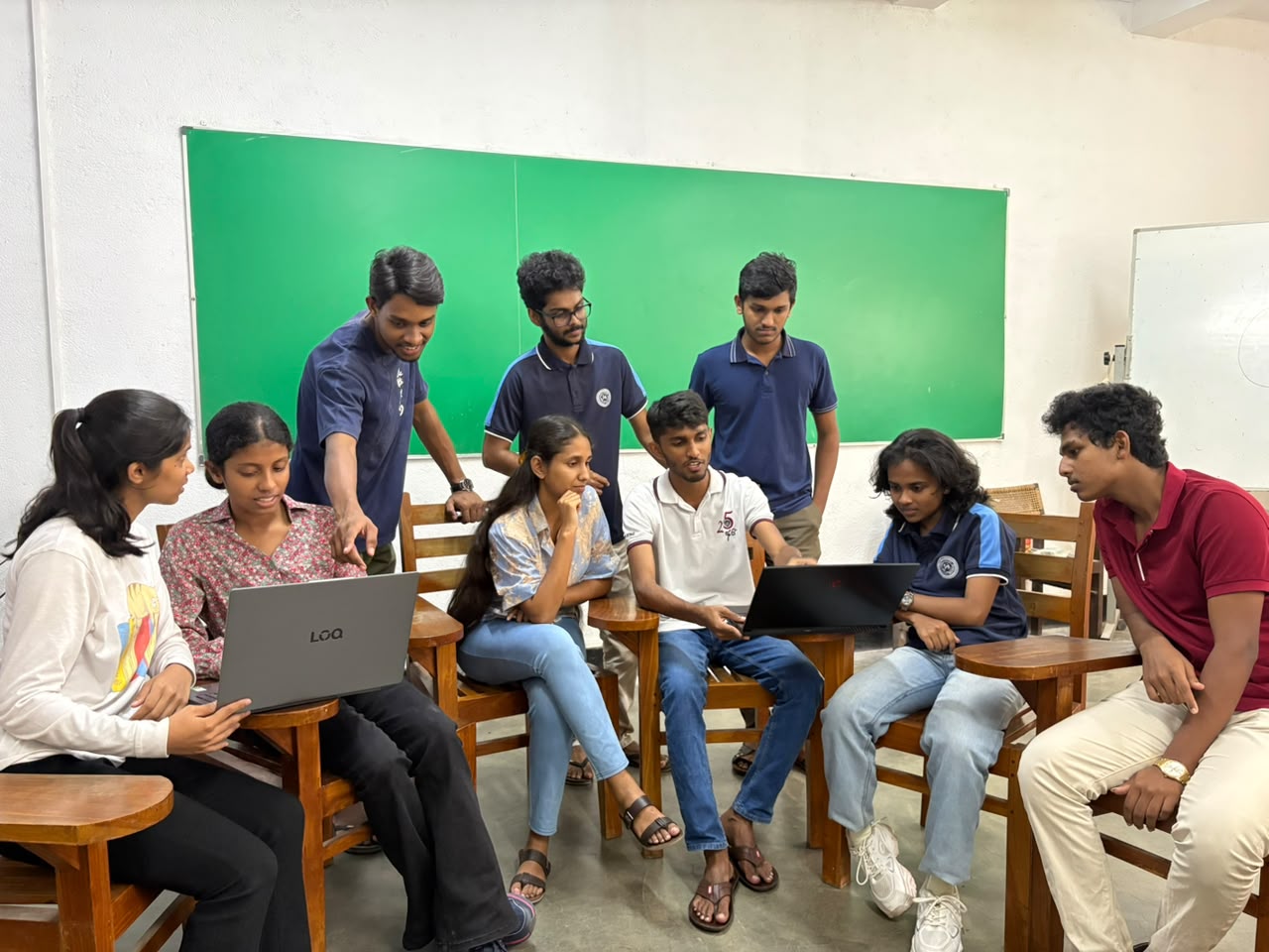 Engineering students collaborating on an English group activity